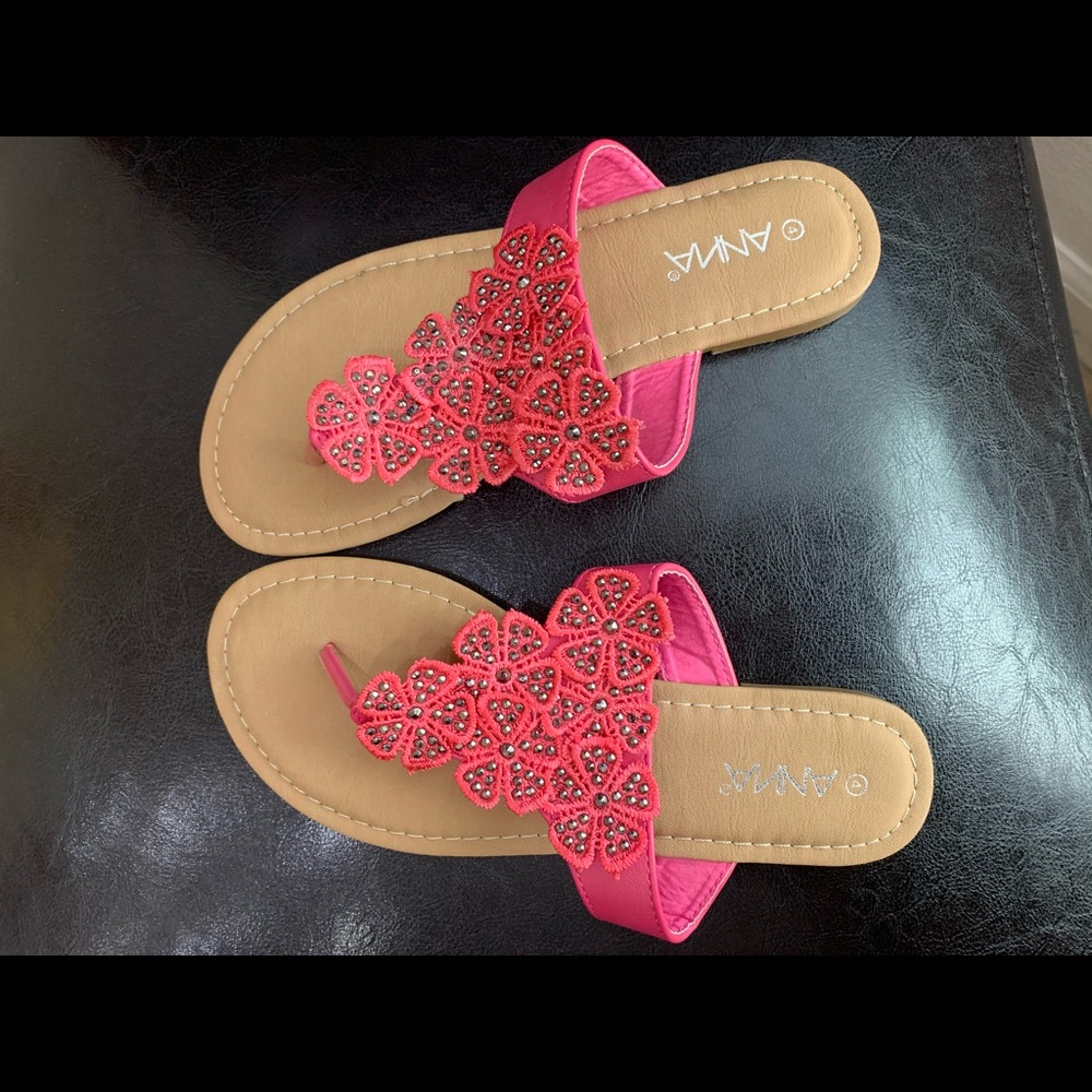 Pink, thong flip flop, with embellishments.